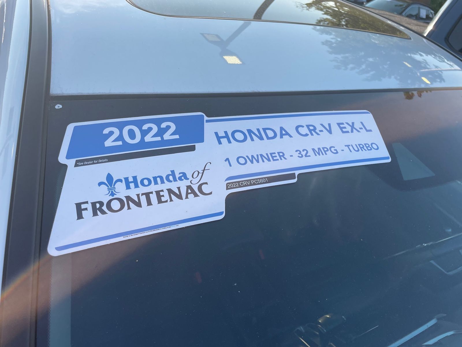 A used-car flyout reading 2022 Honda CR-V EX-L