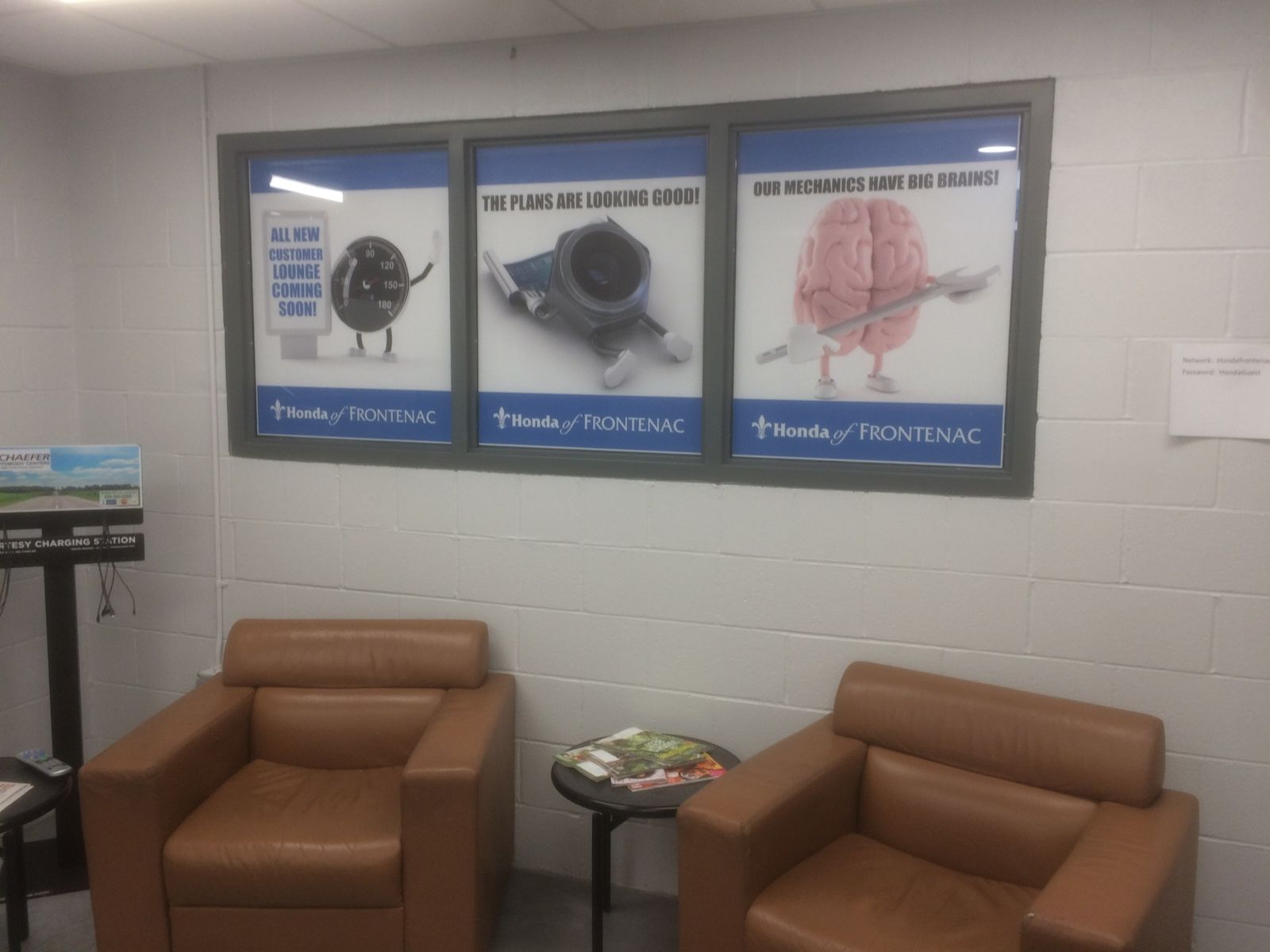Framed graphics above the customer lounge