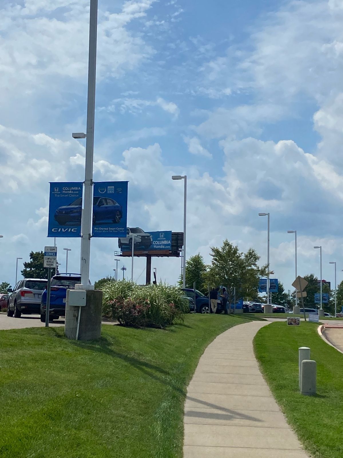Pole banners along a front walk