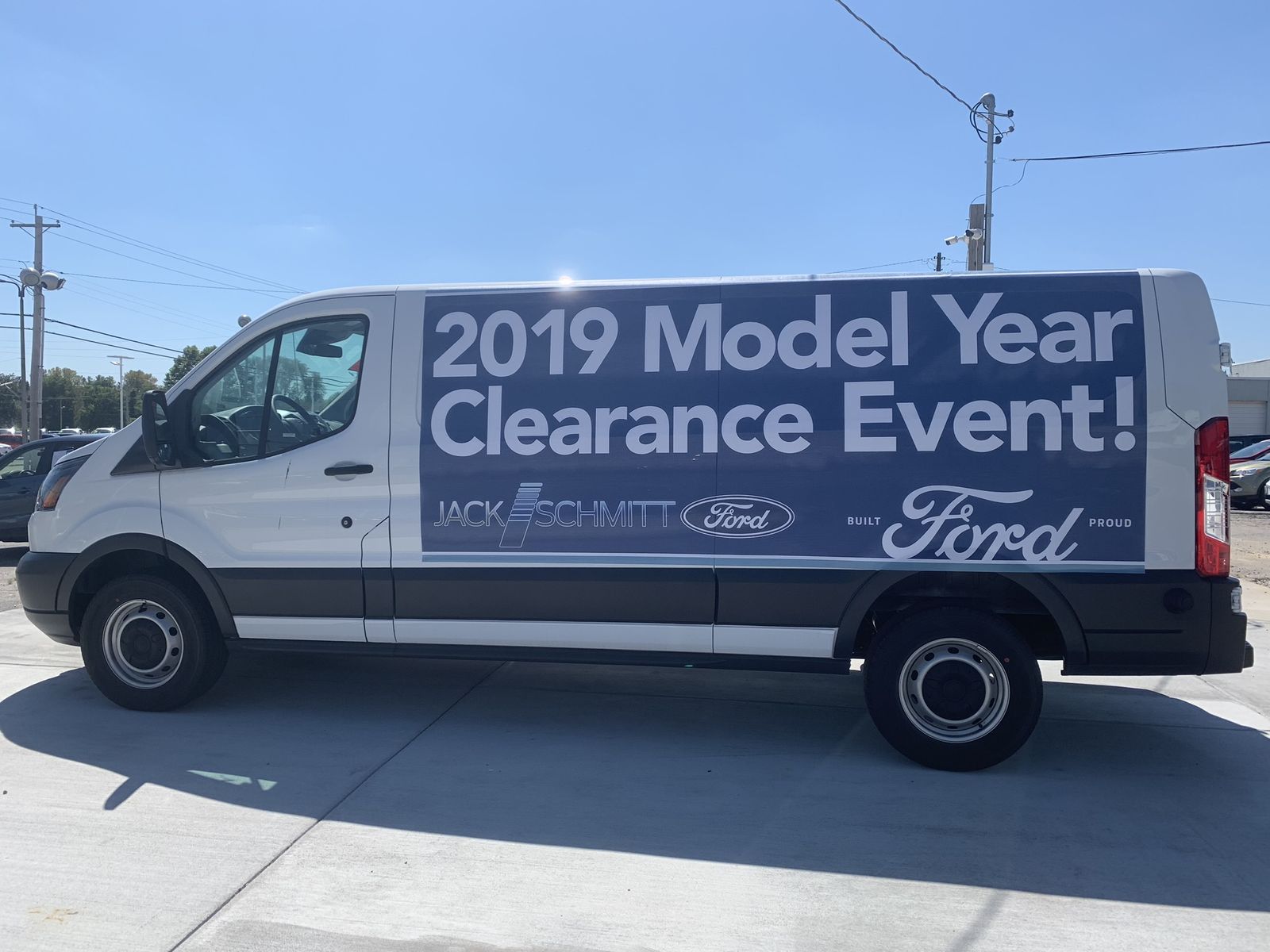 A cargo banner on a Transit van reading 2019 Model Year Clearance Event!