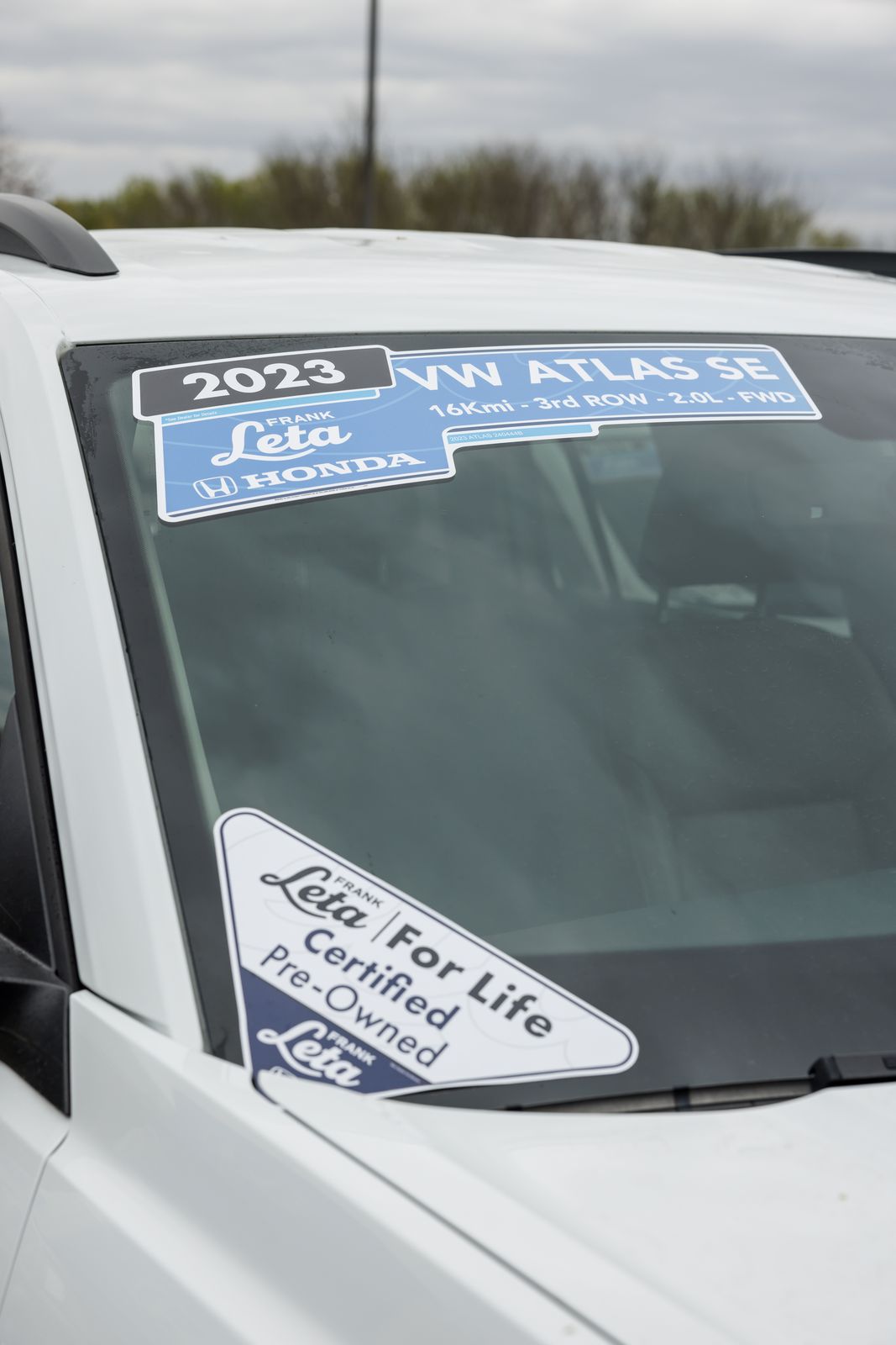 A 2023 VW Atlas with its flyout and a Leta For Life Certified Pre-Owned mark