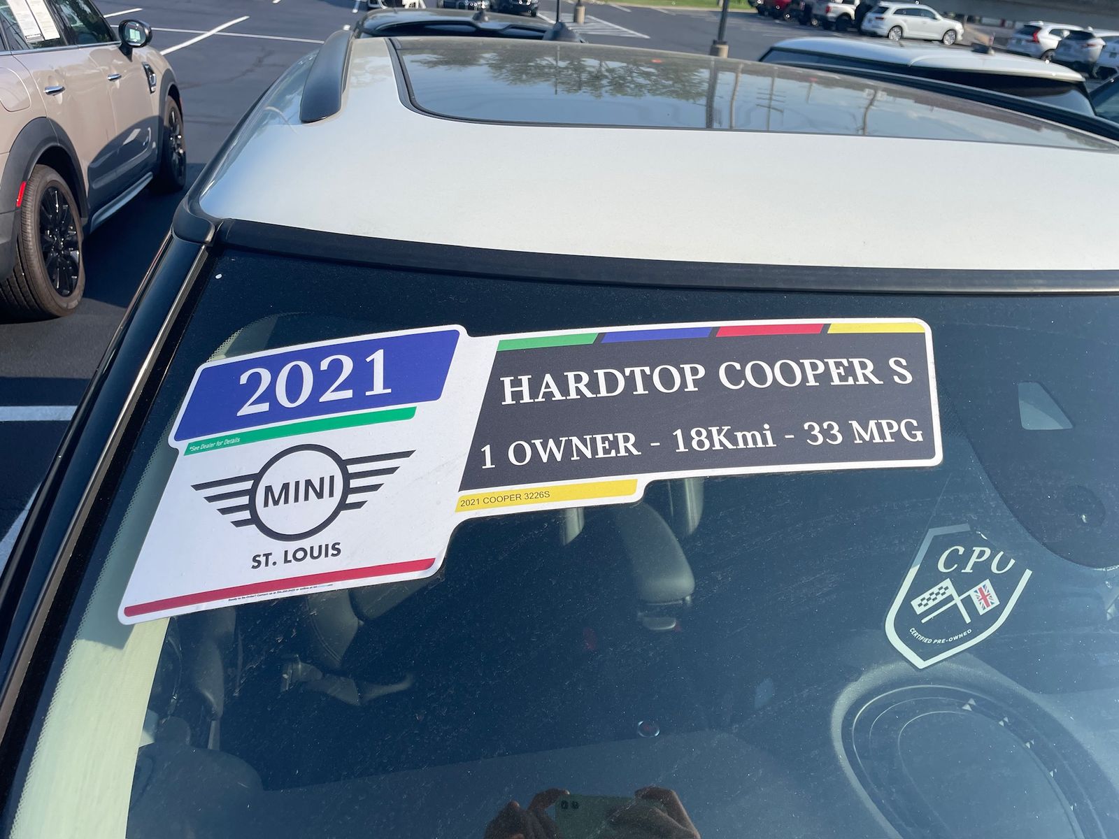 A used-car flyout reading 2021 Hardtop Cooper S