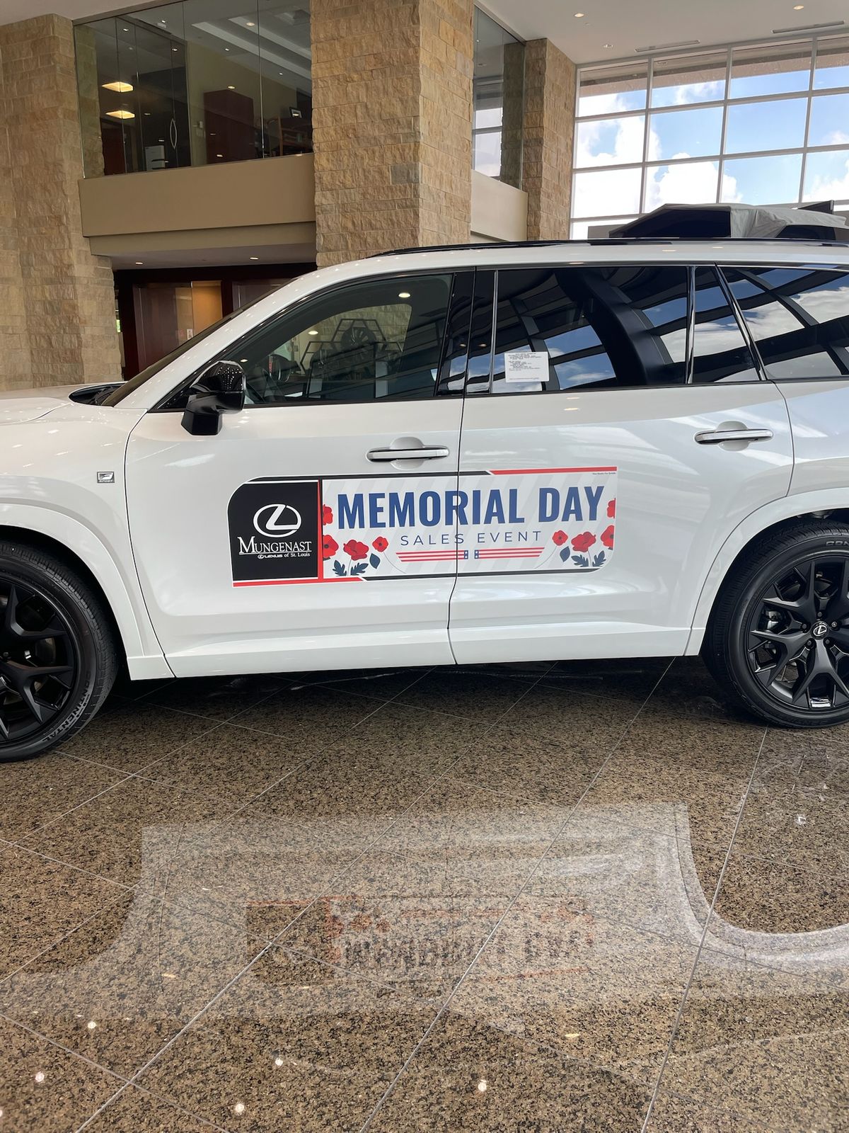 A Memorial Day body side on a showroom SUV