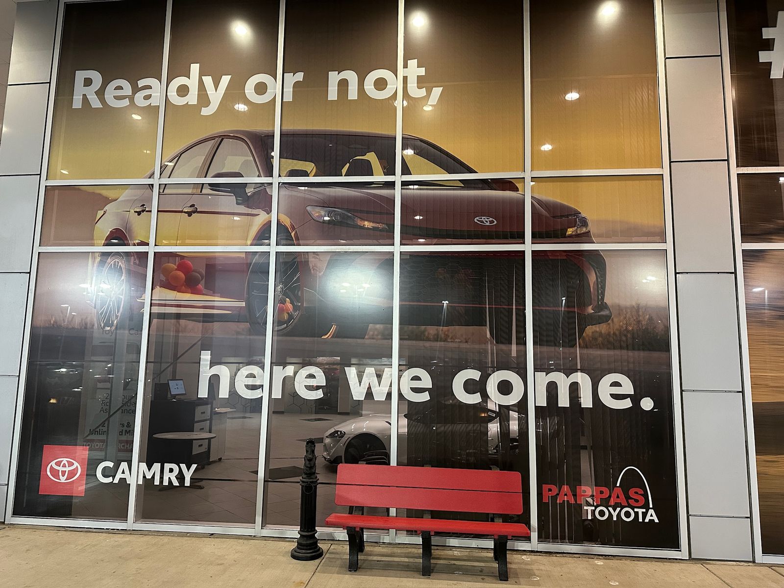 Printed graphics across Pappas Toyota's showroom glass