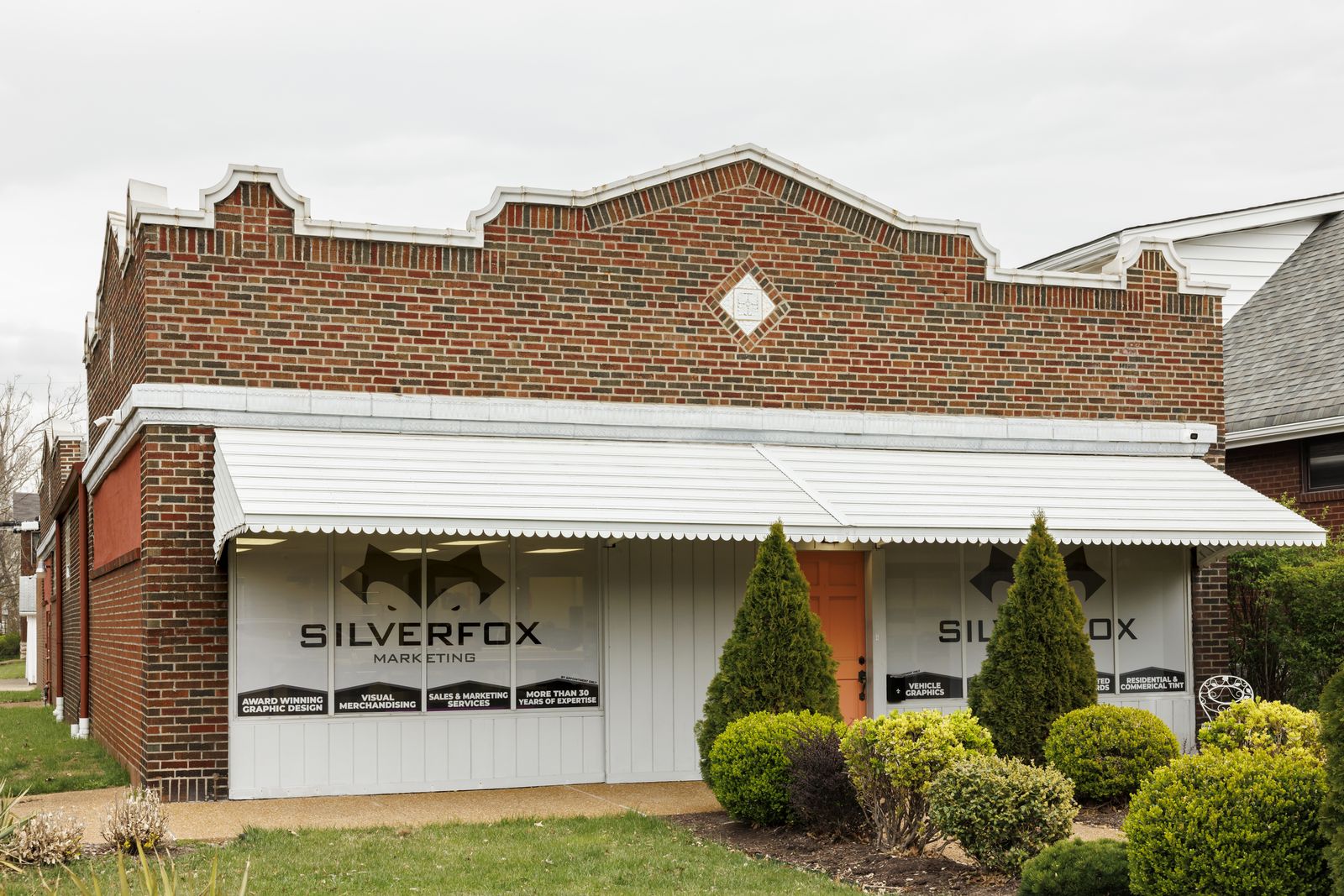 Our shop on Wilmington Avenue in South City, the Silver Fox signs across its windows