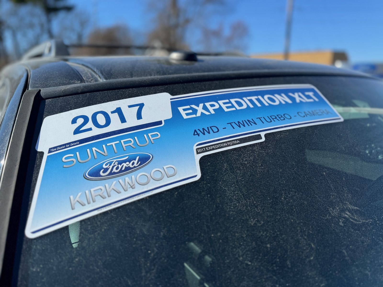 A used-car flyout reading 2017 Expedition XLT